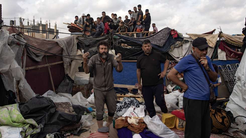 epa11375279 Palestinians inspect their tents after an Israeli army operation on an area previously designated by the Israeli army as safe for displaced Palestinians, in Rafah, southern Gaza Strip, 28 May 2024. More than 36,000 Palestinians and over 1,400 Israelis have been killed, according to the Palestinian Health Ministry and the Israel Defense Forces (IDF), since Hamas militants launched an attack against Israel from the Gaza Strip on 07 October 2023, and the Israeli operations in Gaza and the West Bank which followed it.  EPA/HAITHAM IMAD