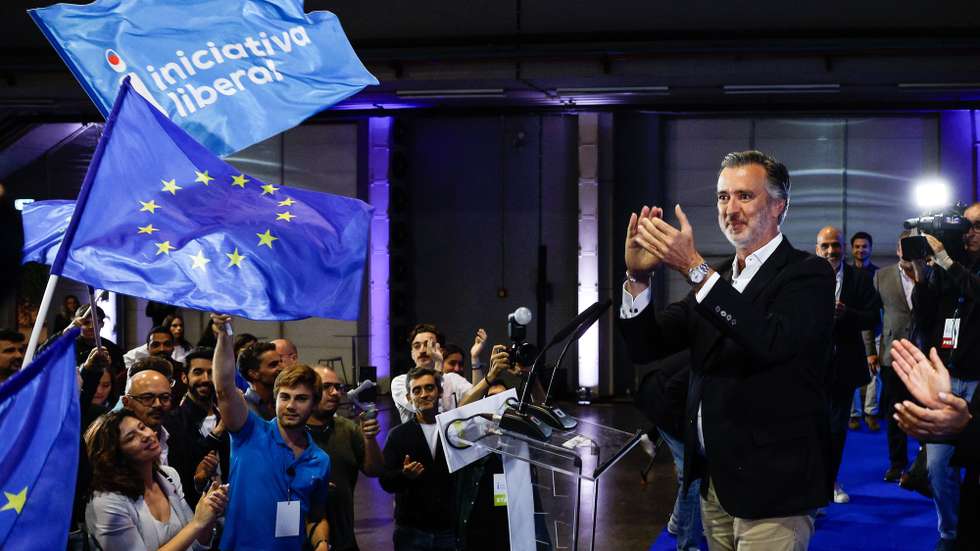 epa11401358 The candidate of the Iniciativa Liberal (IL) party Joao Cotrim de Figueiredo (R) reacts at the party electoral headquarters after knowing the results of the European elections night in Lisbon, Portugal, 09 June 2024. More than 10.8 million registered voters in Portugal and abroad went to the polls to choose 21 of the 720 members of the European Parliament.  EPA/ANTONIO PEDRO SANTOS