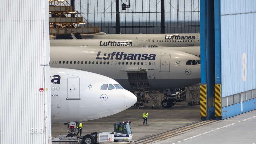 epa11215800 Lufthansa planes are seen park in a hangar, at Frankfurt Airport, in Frankfurt am Main, Germany, 12 March 2024. The UFO cabin crew union has called on its members to strike, to press their demands for better wages. According to Lufthansa, 100,000 passengers should be affected by a two day strike in Frankfurt and Munich airport.  EPA/ANDRE PAIN