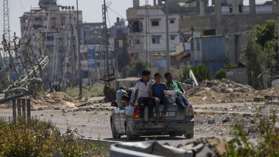 epa11473477 Palestinians after crossing from Gaza City to the southern Gaza Strip during an Israeli military operation in Gaza City, on 11 July 2024. Since 07 October 2023, up to 1.7 million people, or more than 75 percent of the population, have been displaced throughout the Gaza Strip, some more than once, in search of safety, according to the United Nations Relief and Works Agency for Palestine Refugees in the Near East (UNRWA), which added that the Palestinian enclave is 'on the brink of famine', with 1.1 million people (half of its population) 'experiencing catastrophic food insecurity' due to the conflict and restrictions on humanitarian access.  EPA/MOHAMMED SABER