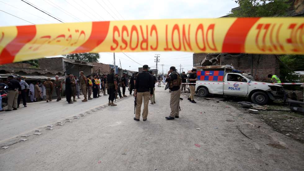 epa11550922 Pakistani security officials inspect the scene of an explosion of an improvised explosive device (IED) targeting a police vehicle, in Peshawar, Pakistan, 16 August 2024. At least five people including two policemen were injured in an explosion targeting police personnel and took place on Peshawar&#039;s Warsak Road in the Pir Bala area, police and hospital officials said. Superintendent of Police Warsak Division Muhammad Arshad Khan said the Machnigate Police Station&#039;s vehicle was on routine patrol when the bomb exploded. The rise in insurgent attacks, particularly in Khyber Pakhtunkhwa and Balochistan, has been linked to the Taliban&#039;s resurgence in Afghanistan, with Pakistan accusing the Afghan government of harboring militant groups.  EPA/ARSHAD ARBAB