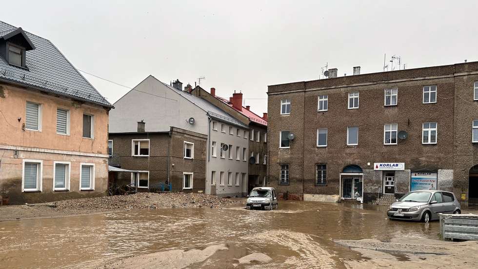 epa11606607 Damages on flooded streets after heavy rainfalls in Glucholazy, southwestern Poland, 15 September 2024. The southern regions of Poland are experiencing record rainfall and severe flooding caused by heavy rains from the Genoese depression &quot;Boris&quot;, which reached Poland on Thursday, September 12. People in flooded areas of the region are being forced to evacuate, and water is flooding villages and towns. River levels are at or above alarming levels. Poland&#039;s prime minister confirmed on September 15 that one person had died as a result of the flooding.  EPA/MICHAL MEISSNER POLAND OUT