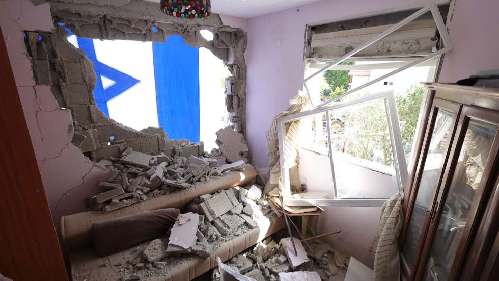 epa11618509 A view of damage inside a house after a missile strike on a residential neighbourhood in Kiryat Bialik, northern Israel, 22 September 2024. The Israeli military said that about 85 projectiles were identified crossing from Lebanon into several areas in northern Israel on 22 September. Some of the shells were intercepted, and fallen projectiles were located in Kiryat Bialik, Tsur Shalom and Moreshet, igniting fires in the area, the statement added. There are no casualties in the incident. Following the attack on northern Israel the Israel Defense Forces (IDF) said it conducted strikes against Hezbollah targets in Lebanon.  EPA/ABIR SULTAN
