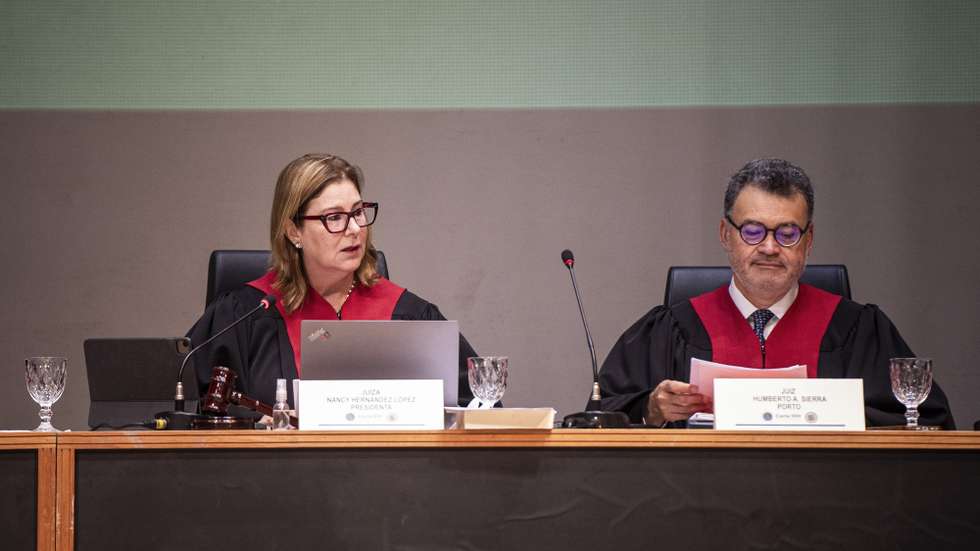 epa11378427 The president of the Inter-American Court of Human Rights (IACHR), Judge Nancy Hernandez Lopez (L), accompanied by Judge Humberto Sierra Porto, speaks during a hearing in the Teatro Amazonas opera house in Manaus, Brazil, 29 May 2024. The Inter-American Court of Human Rights (IACtHR) from 27 to 29 May has heard social, indigenous, and academic organizations to draft an advisory opinion requested by Colombia and Chile on the obligation of States regarding the climate emergency.  EPA/Raphael Alves