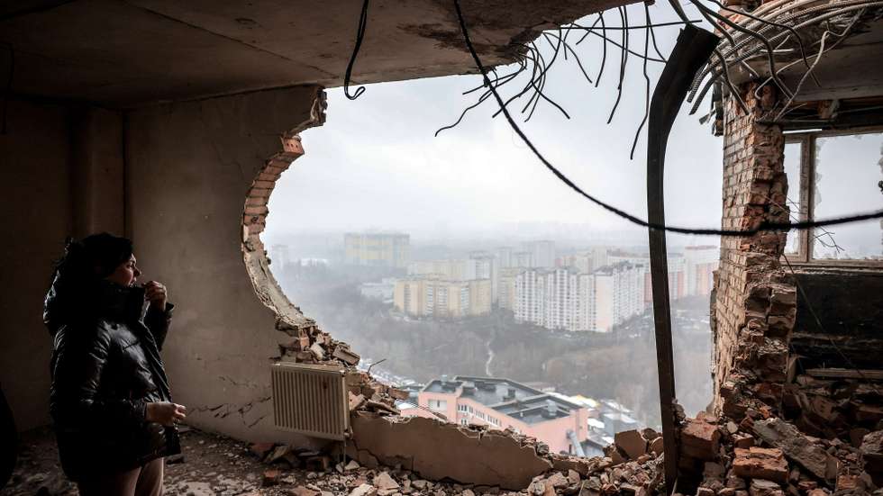 epa11040617 Local resident Tetiana (40) inspects her ruined flat at the site of a drone attack on a residential building in Kyiv (Kiev), Ukraine, 22 December 2023, amid the Russian invasion. At least two people were injured after a Russian drone attack hit a residential building in the Solomianskyi district of Kyiv, the mayor of the city Vitali Klitschko wrote on telegram. For the third time in the last six days, Russia's 'Shahed' type drones attempted to hit infrastructure and residential buildings in the Ukrainian capital, the Kyiv City Military Administration said. Russian troops entered Ukrainian territory on 24 February 2022, starting a conflict that has provoked destruction and a humanitarian crisis.  EPA/Oleg Petrasyuk