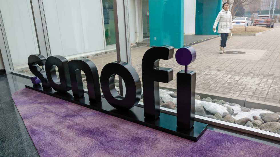 epa11113839 A woman walks during a media tour at Sanofi's office in Beijing, China, 30 January 2024. Sanofi is a pharmaceutical company who develops, manufactures, and distributes healthcare products and pharmaceuticals for diabetes solutions, human vaccines, rare diseases, emerging markets, and consumer healthcare.  EPA/MARK R. CRISTINO