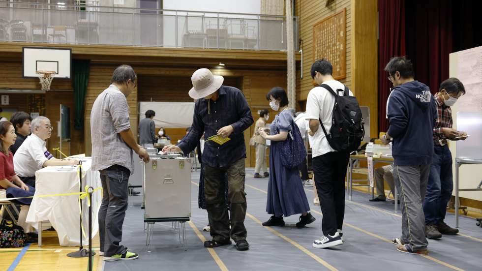 epa11686242 People vote during the general election at a polling station in Tokyo, Japan, 27 October 2024. Following the dissolution of the parliament by Japan’s Prime Minister Shigeru Ishiba, voters are called for elections of the house of representatives (the lower house).  EPA/FRANCK ROBICHON