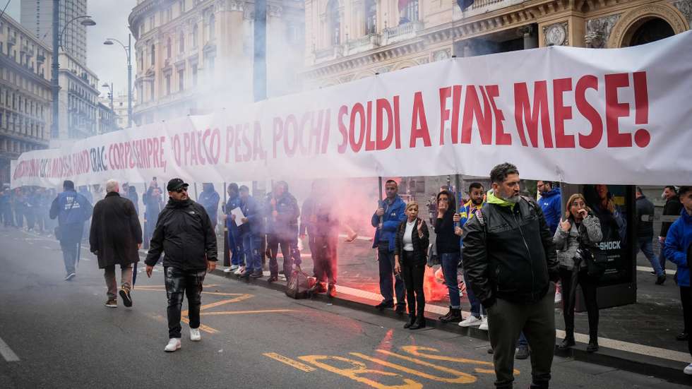 epa11747475 Demonstrators attend a general strike in Naples, Italy, 29 November 2024. The Italian General Confederation of Labour (CGIL) and the Italian Union of Labour (UIL) called for a nationwide strike against the government's budget proposal, an increase in wages and pensions, financing health, education, and public services, and investing in industrial policies.  EPA/CESARE ABBATE