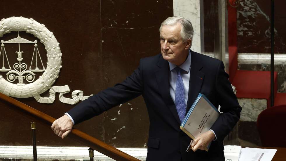 epa11757052 French Prime Minister Michel Barnier leaves the rostrum after delivering a speech during a no-confidence vote against his government at the National Assembly, in Paris, France, 04 December 2024. The no-confidence vote comes after the French prime minister activated Article 49.3 of the Constitution to pass his social security budget bill without a vote, as a majority of members of Parliament rejected his project on 02 December 2024.  EPA/YOAN VALAT