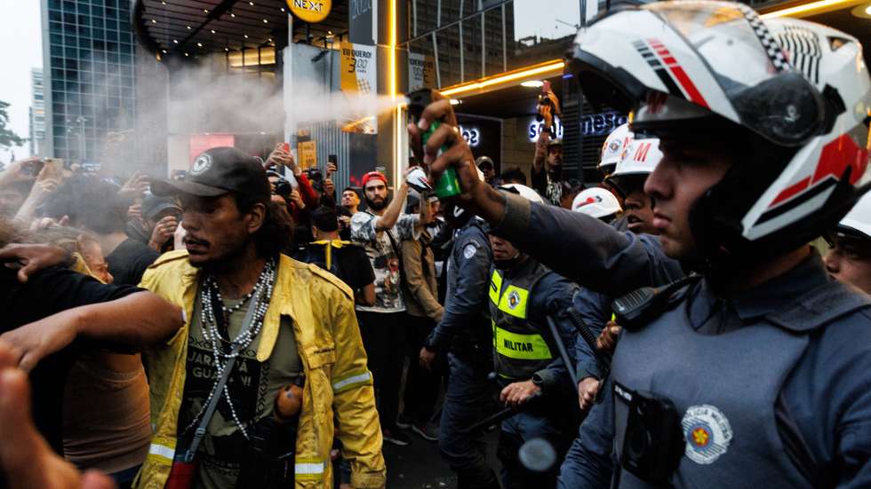 epa11606888 Police and protesters clash over agrarian reform and against the fires affecting the entire country in Sao Paulo, Brazil, 15 September 2024. For over a month, nearly 60 percent of the countryâ€™s territory has been experiencing severe drought, with temperatures much higher than usual, leading to thousands of fire outbreaks across all regions, particularly impacting areas of the Amazon, the Central Cerrado savanna, and the Pantanal.  EPA/ISAAC FONTANA