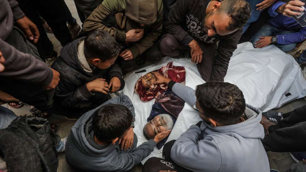 epa11769911 Palestinian relatives of the Al Fayomi family mourn over their bodies during their funeral at the Al Awda Hospital in the Al Nusairat refugee camp, central Gaza Strip, 11 December 2024. According to the Palestinian Ministry of Health in Gaza, at least eight members of the Al Fayomi family were killed in an Israeli airstrike in the Al Nusairat refugee camp. More than 45,000 Palestinians and over 1,400 Israelis have been killed, according to the Palestinian Health Ministry and the Israeli Army, since Hamas militants launched an attack against Israel from the Gaza Strip on 07 October 2023, and the Israeli operations in Gaza and the West Bank which followed it.  EPA/MOHAMMED SABER ATTENTION: GRAPHIC CONTENT