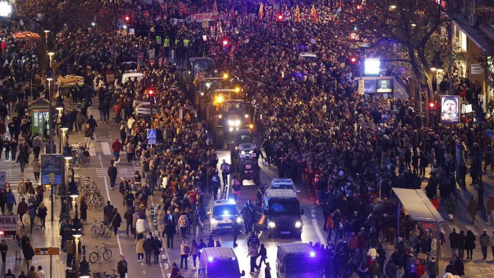 epa11797826 Protesters gather to demand Valencia's regional president Carlos Mazon's resignation during a rally in Valencia, eastern Spain, 29 December 2024. Flash floods hit Valencia and surrounding areas on 29 October 2024, killing over 200 people.  EPA/ANA ESCOBAR