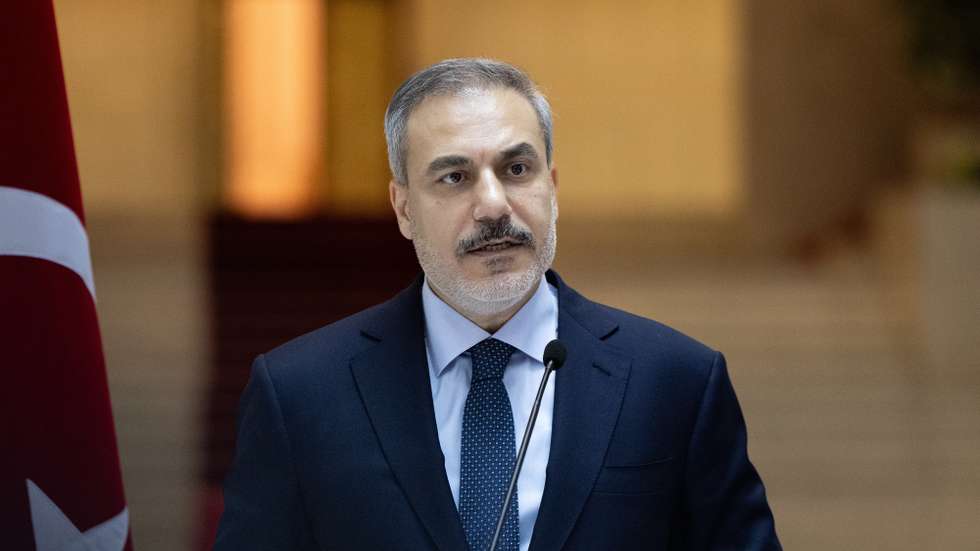 epa11790229 A handout photo made available by the Turkish Foreign Ministry Press Office shows Turkish Foreign Minister Hakan Fidan attending a press conference after a meeting with Syria's rebel leader al-Sharaa in Damascus, Syria, 22 December 2024.  EPA/TURKISH FOREIGN MINISTRY PRESS OFFICE HANDOUT HANDOUT EDITORIAL USE ONLY/NO SALES