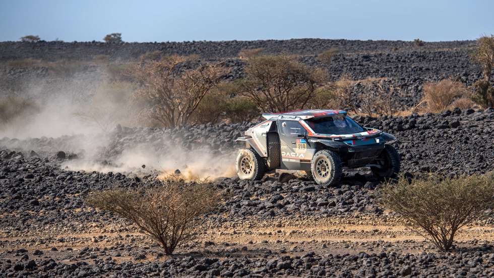 epa11811560 French driver Sebastien Loeb and Belgian co-driver Fabian Lurquin drive their Dacia Sandrider for The Dacia Sandriders during the third stage of the 2025 Dakar Rally, from Bisha to Al Henakiyah, Saudi Arabia, 07 January 2025.  EPA/Gerard Laurenssen