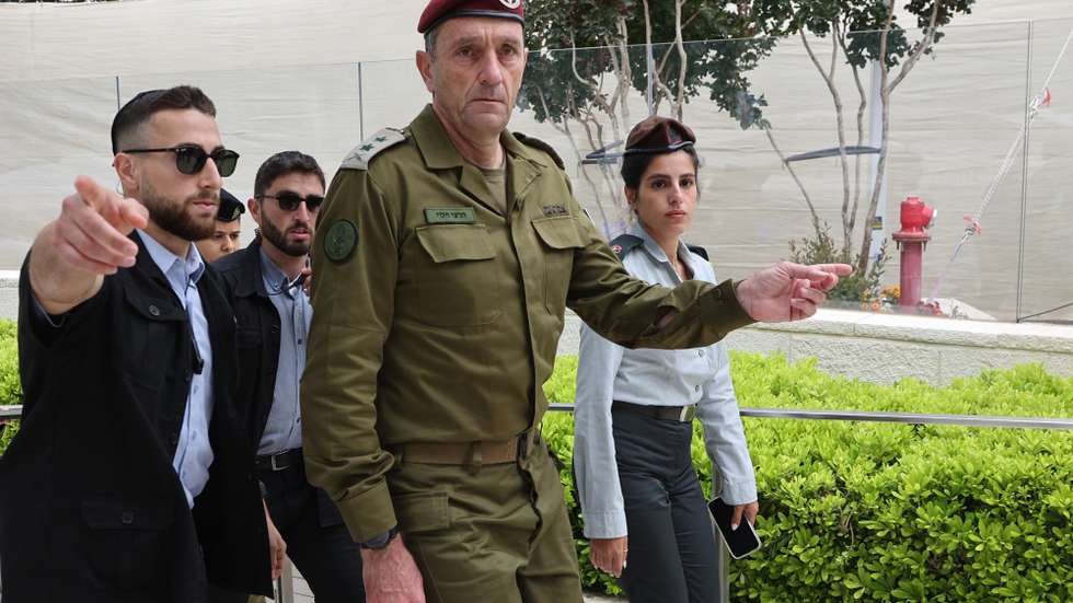 epa11336599 Israeli army chief Herzi Halevi (C) arrives at a ceremony marking Memorial Day for fallen soldiers of Israel's wars and victims of attacks at Israel's Mount Herzl national military cemetery in Jerusalem, 13 May 2024. Israel marks Memorial Day (Yom HaZikaron) to commemorate fallen soldiers and victims of attacks recorded since 1860 by the defence ministry.  EPA/GIL COHEN-MAGEN / POOL