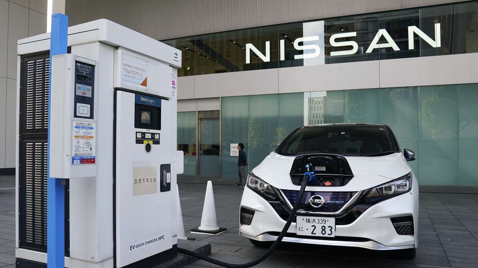 epa11328570 An electric vehicle is charged at headquarters of Nissan Motor Co., Ltd. in Yokohama, Kanagawa Prefecture, south of Tokyo, Japan, 09 May 2024. On 09 May 2024 Nissan Motor released its financial results for the full year ended March 2024, reporting full-year operating profit of 568.7 billion yen, representing a 51 percent increase from the previous year.  EPA/KIMIMASA MAYAMA