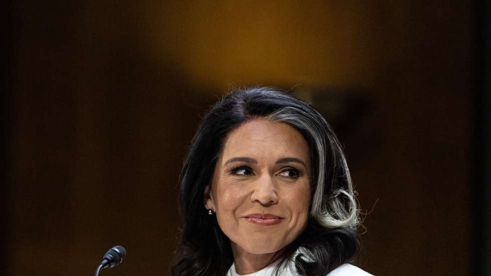 epa11864067 Tulsi Gabbard, nominee for Director of National Intelligence, smiles at Sen. Joni Ernst (R-IA) as she is introduced during her confirmation hearing before the Senate Select Committee on Intelligence on Capitol Hill in Washington, DC, USA, 30 January 2025.  EPA/ANNA ROSE LAYDEN