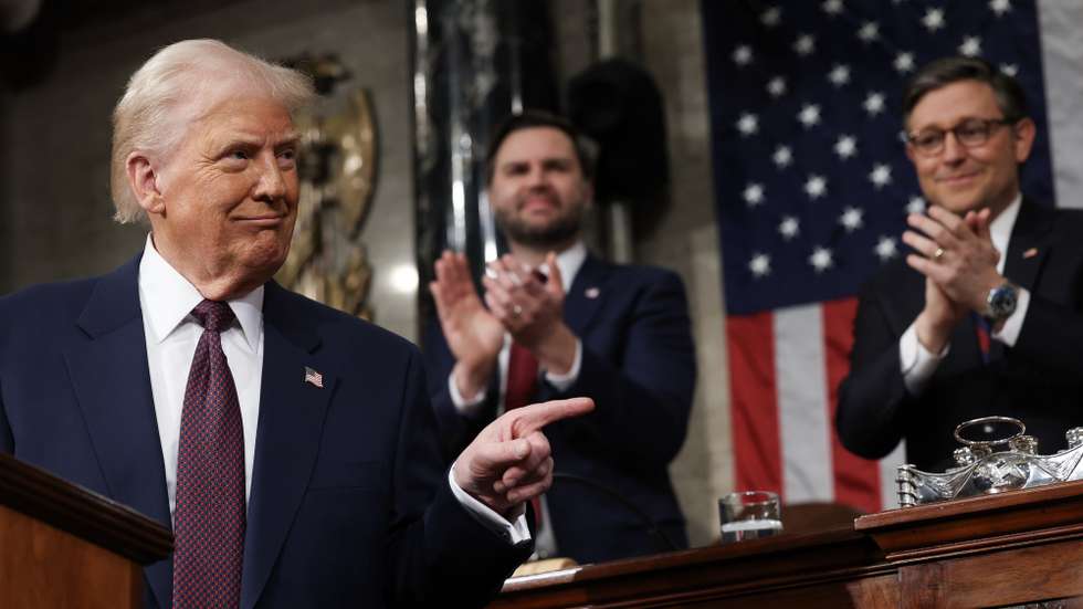 epa11941332 US President Donald Trump (L) addresses a joint session of the United States Congress at the US Capitol in Washington, DC, USA, on 04 March 2025. Also pictured are US Vice President JD Vance (C) and US Speaker of the House Mike Johnson (R).  EPA/WIN MCNAMEE / POOL