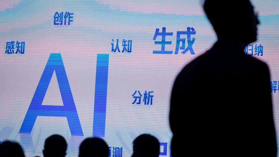 epa10922888 People attend a forum about artificial intelligence during the Baidu 'Prompt the World' artificial intelligence event at the Shougang Park in Beijing, China, 17 October 2023. Baidu unveiled multiple artificial intelligence native applications such as Ernie Bot 4.0, the ChatGPT equivalent language model and offered insights on new opportunities through AI-native thinking in collaboration with enterprises, users, and partners.  EPA/MARK R. CRISTINO
