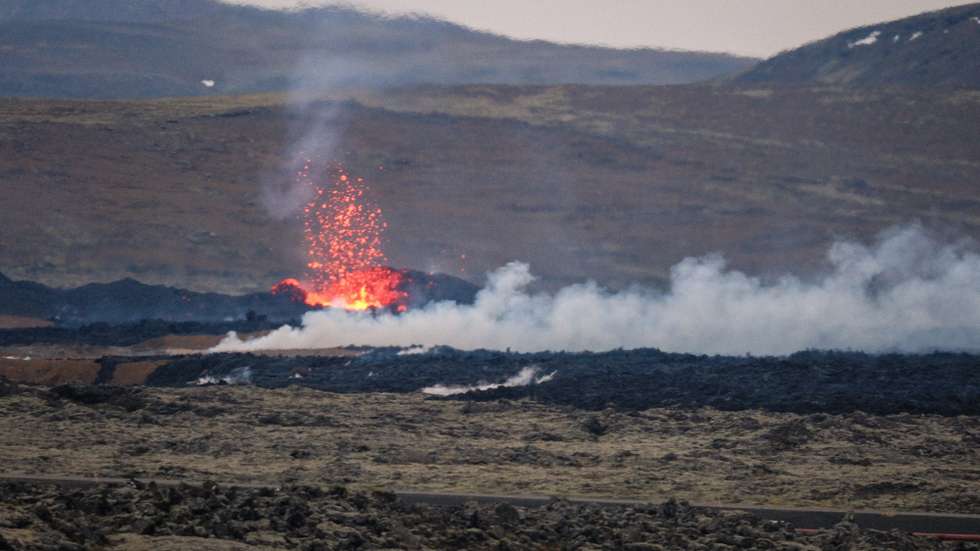 epa11079513 Lava explosions and rising smoke after a volcanic eruption near the town of Grindavik, in the Reykjanes peninsula, southwestern Iceland, 15 January 2024. A volcanic eruption began north of the town of Grindavik on the Reykjanes peninsula on 14 January, prompting authorities in Iceland to evacuate the small fishing town in the early morning as a precaution. The eruption is not expected to impact additional populated areas and does not present a 'threat to life', the Government of Iceland stated, adding that there are no disruptions to flights to and from Iceland. This is the second eruption in the area since December 2023, and the fifth since 2021.  EPA/ANTON BRINK