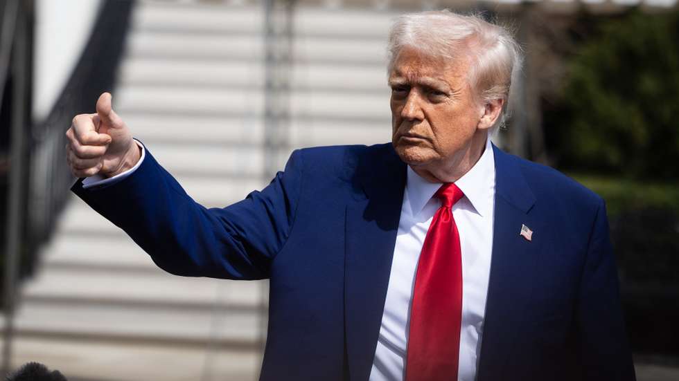 epa12008083 US President Donald Trump gestures as he departs the White House, in Washington, DC, USA, 03 April 2025.  EPA/FRANCIS CHUNG / POOL