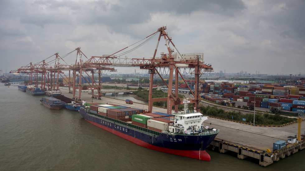 epa10153946 An aerial photo shows cargo ships loading containers in the port on the Beijing-Hangzhou Canal, where the Grand Canal and the Yangtze River meet, near Yangzhou, Jiangsu Province, China, 02 September 2022.  EPA/ALEX PLAVEVSKI