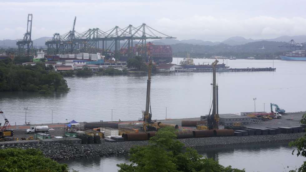 epa12167165 People work on the construction of the fourth bridge over the Panama Canal, in Panama City, Panama 09 June 2025. Panamanian President Jose Raul Mulino denounced a $1.8 billion cost overrun in the construction of the fourth bridge over the Canal, which is being carried out by a Chinese consortium and is five years behind schedule, following a change in the original plans in 2020.  EPA/Carlos Lemos