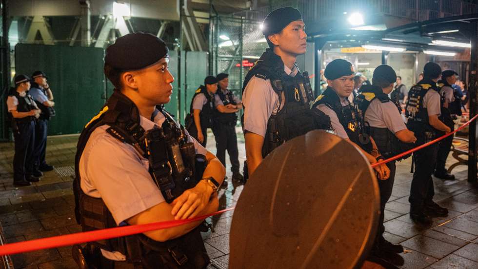 epa12155432 Police officers stand guard at Victoria Park in Hong Kong, China, 04 June 2025. Hong Kong's Victoria Park saw no commemorative events on the 36th anniversary of the Tiananmen crackdown, as the public commemoration of the 1989 Tiananmen Square protests is banned under the National Security Law passed in 2020.  EPA/LEUNG MAN HEI
