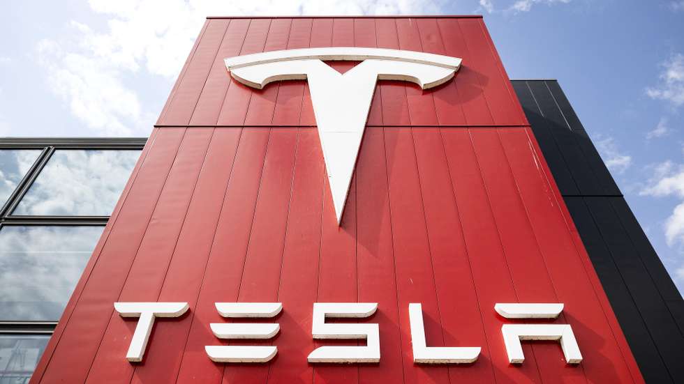 epa12069130 The logo of Tesla on its European headquarters in Amsterdam, the Netherlands, 02 May 2025. Sales of Tesla vehicles in the Netherlands dropped by nearly 74% in April compared with the same month last year, according to data from Dutch automotive industry organizations.  EPA/RAMON VAN FLYMEN