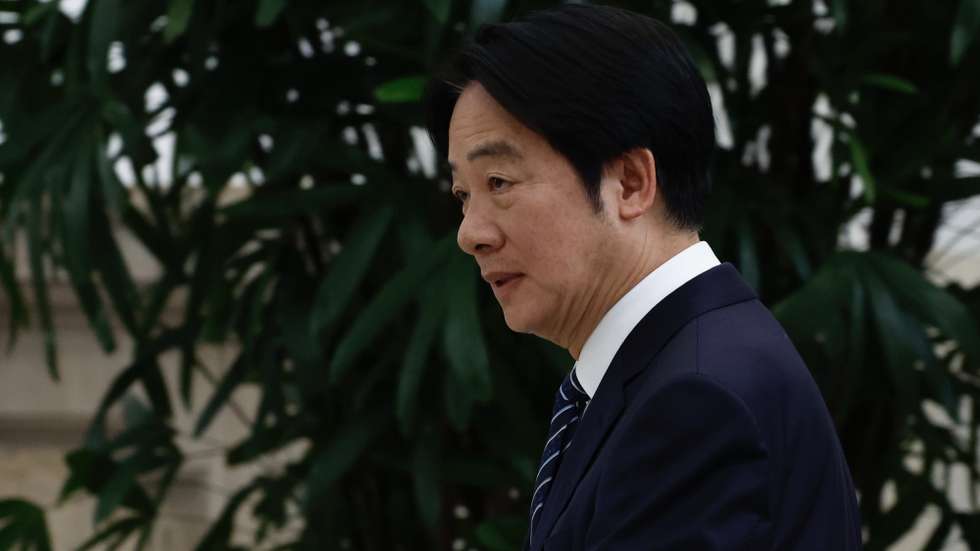 epa12118280 Taiwanese President William Lai (Lai Cheng-te) departs after his speech inside the presidential office building in Taipei, Taiwan, 20 May 2025.  On his first year anniversary speech, Lai discussed various issues including cross strait politics and the economy.  EPA/RITCHIE B. TONGO