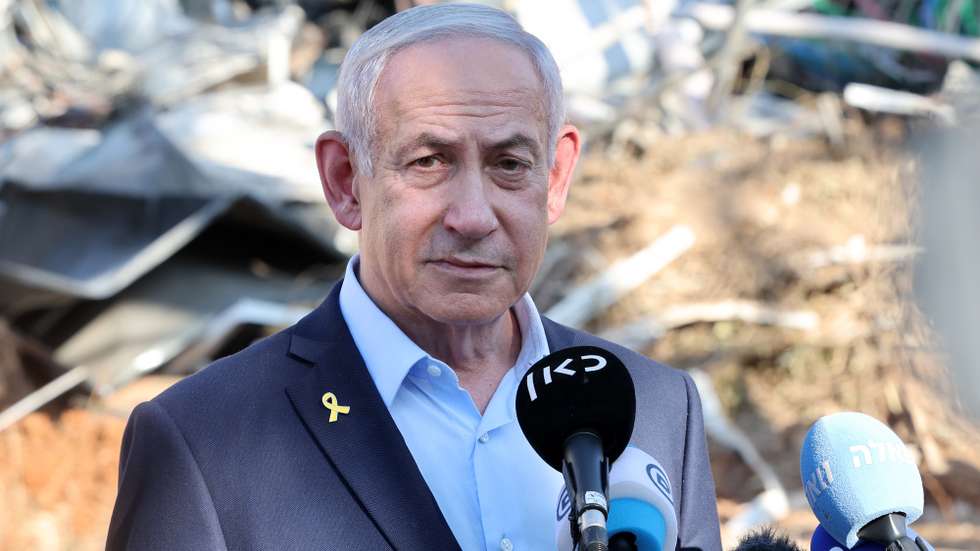 epa12187738 Israel's Prime Minister Benjamin Netanyahu delivers a statement as he visits the site of the Weizmann Institute of Science, which was hit by Iranian missiles in the central city of Rehovot, Israel, 20 June 2025. Iran and Israel have been exchanging fire since Israel carried out missile strikes on Iran on 13 June 2025.  EPA/JACK GUEZ / POOL