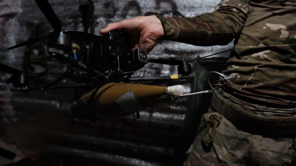 epa12256347 A Ukrainian drone pilot from the 20th Lyubart Brigade of the 1st Corps of the National Guard Azov shows a FPV drone armed with explosives with which his team is preparing to carry out an attack mission on the frontline in Toretsk, Donetsk region, Ukraine, 22 July 2025 (issued 23 July 2025). First Person View (FPV) drones have become one of the most widely used weapons by the Ukrainian and Russian armies in the conflict in Ukraine  EPA/MARIA SENOVILLA