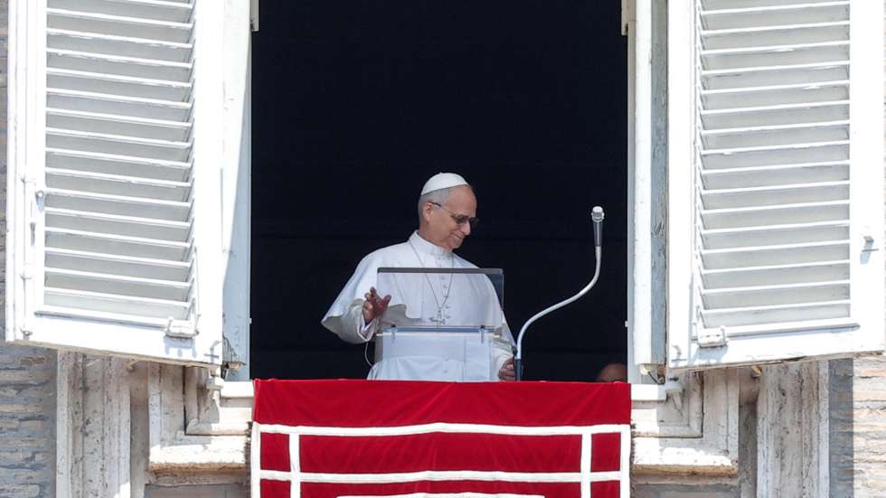 epa12292087 Pope Leo XIV leads his Sunday Angelus prayer from the window of his office overlooking Saint Peter's Square, Vatican City, 10 August 2025.  EPA/GIUSEPPE LAMI