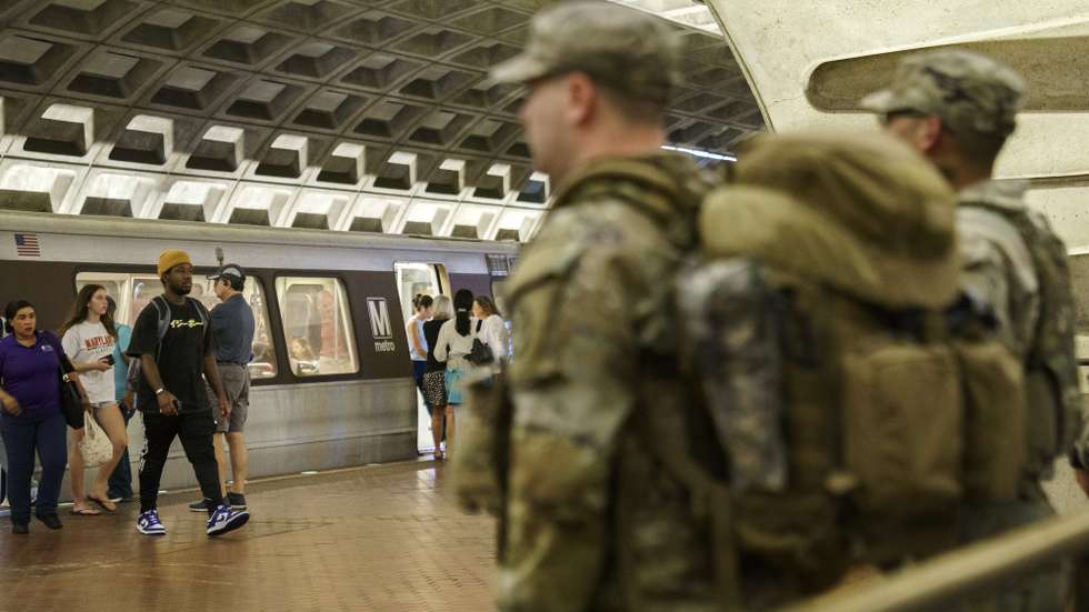 epa12313484 Members of the National Guard patrol inside Metro Center Station in Washington DC, USA, 20 August 2025. As President Trump's takeover of Washington, DC, policing enters its second week, Mississippi joins three other Republican-led states that have vowed to deploy National Guard members in support of the Trump administration's operation.  EPA/WILL OLIVER