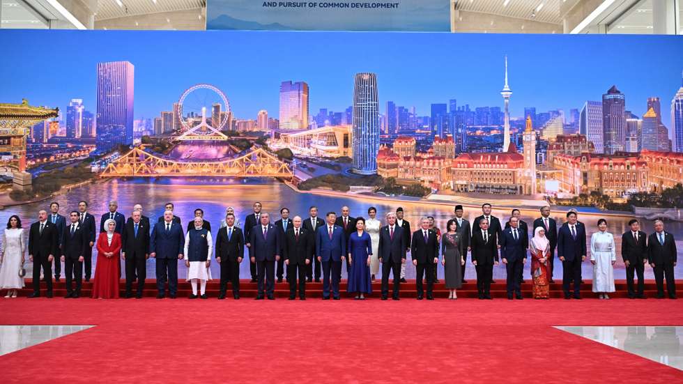 epa12339905 Participants pose for a family photo during a ceremony to welcome Heads of States of the SCO (Shanghai Cooperation Organisation) in Tianjin, China, 31 August 2025.  EPA/SERGEY BOBYLEV/SPUTNIK/KREMLIN POOL / POOL MANDATORY CREDIT