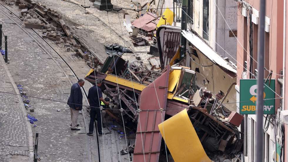 Criminal investigation department policemen make an assessment of the accident of the Gloria lift (funicular) in Lisbon, a popular transportation used by tourists, that derailed yesterday in Lisbon, Portugal, 4th September 2025. The accident caused  the death to 16 people and also left 5 people seriously injured. The number of deaths was corrected by the civil protection authorities.  MIGUEL A. LOPES/LUSA