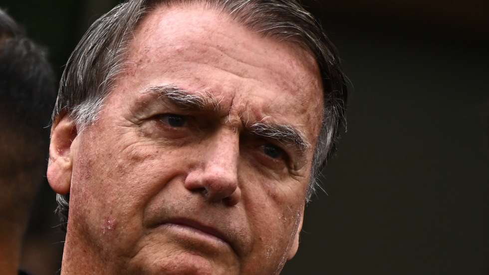 epa12377400 Brazilian former President Jair Bolsonaro leaves the DF Star Hospital in Brasilia, Brazil, 14 September 2025. Bolsonaro returned to house arrest at his residence in Brasilia hours after being admitted to a private hospital for surgery. The former head of state was sentenced by the Supreme Court to 27 years and three months in prison for conspiring against the democratic order following his defeat in the 2022 elections against current President Luiz Inacio Lula da Silva.  EPA/ANDRE BORGES