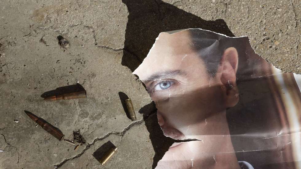 epa12241144 (FILE) - A portrait of the former Syrian president Bashar al-Assad on the ground at the Mezzeh Air Base on the outskirts of Damascus, Syria, 16 December 2024 (reissued 16 July 2025). Bashar al-Assad assumed power at the age of 34, following the death of his father, Hafez al-Assad, in 2000. Bashar al-Assad's 25 years of rule profoundly marked Syria's political landscape, leaving a country marked by deep authoritarianism, sectarian division, institutional decay and a civil war recognized as one of the world's worst humanitarian crises.  EPA/ANTONIO PEDRO SANTOS