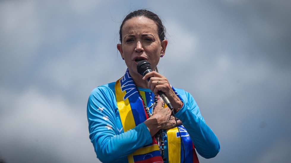 epa12444143 (FILE) Maria Corina Machado speaks to supporters during a caravan to promote the vote for the presidential candidate of the main opposition alliance in Venezuela, Edmundo Gonzalez Urrutia, ahead of the presidential elections, in Maturin, Venezuela, 20 July 2024 (reissued 10 October 2025). The Norwegian Nobel Committee has announced at the Norwegian Nobel Institute in Oslo, Norway, 10 October 2025, to award the Nobel Peace Prize for 2025 to Venezuelan opposition leader Maria Corina Machado.  EPA/Henry Chirinos
