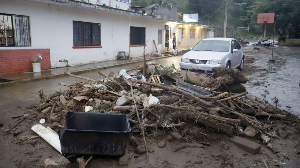 epa12449755 A view of an area affected by heavy rains in Huauchinango, Mexico, 12 October 2025.  EPA/Hilda Ríos