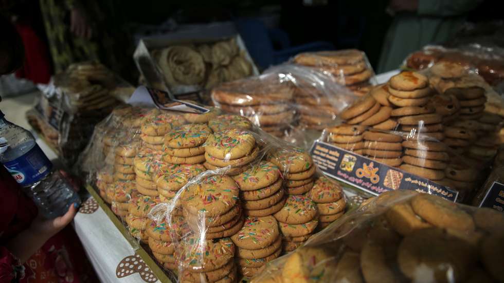 epa12437840 Food products on display at the annual Afghan Agricultural and Livestock Products Exhibition in Kabul, Afghanistan, 07 October 2025. The event opened at Kabul's Badam Bagh with 270 booths showcasing produce and handicrafts.  EPA/SAMIULLAH POPAL