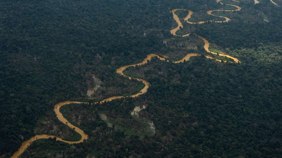 epa10444792 The dark waters of Mucajai river, due to the presence of illegal mining during a Brazilian Air Force mission to deliver supplies to the Yanomami people living on Indigenous Land near the Surucucu military base, in the Amazonian state of Roraima, Brazil, 02 February 2023. The mission departed from the Boa Vista Air Base, the state capital, in an Embraer KC-390 cargo plane. The Yanomami people are experiencing a humanitarian crisis due to the presence of illegal mining on their lands.  EPA/Raphael Alves