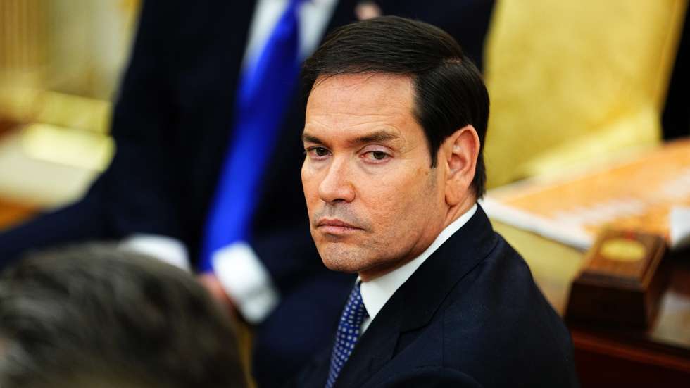epa12474341 US Secretary of State Marco Rubio looks on as US President Donald J. Trump meets with NATO Secretary General Mark Rutte in the Oval Office of the White House in Washington, DC, USA, 22 October 2025. The leaders met to discuss continued support for Ukraine.  EPA/AARON SCHWARTZ / POOL