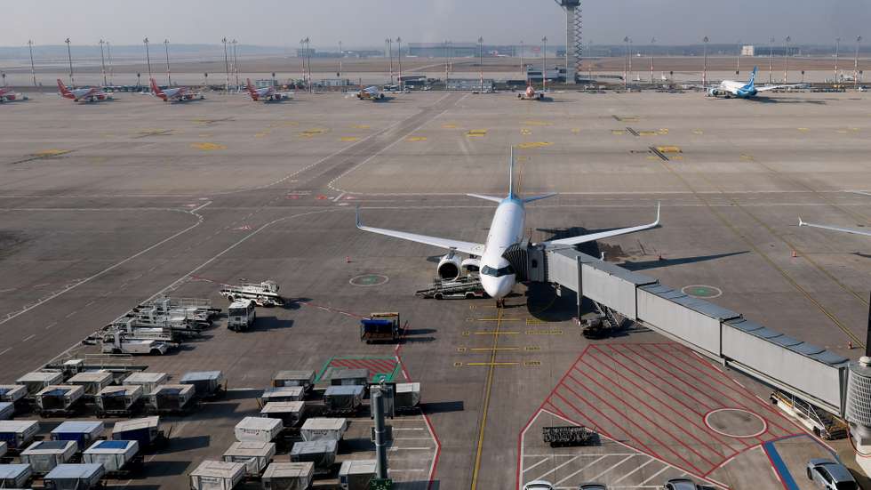 epa11953346 A grounded airplane at an empty terminal of the Berlin-Brandenburg airport, in Schönefeld, Germany, 10 March 2025. The United Services Trade Union (ver.di) is calling for an all-day warning strike at several German airports on 10 March 2025, for employees in the aviation security sector who work in passenger, personnel, goods and cargo screening, as well as in service areas.  EPA/FILIP SINGER