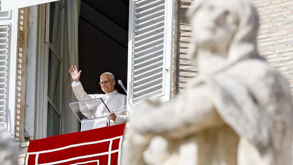 epa12498773 Pope Leo XIV leads the Angelus prayer from the window of his office overlooking Saint Peter's Square, in Vatican City, 02 November 2025.  EPA/FABIO FRUSTACI