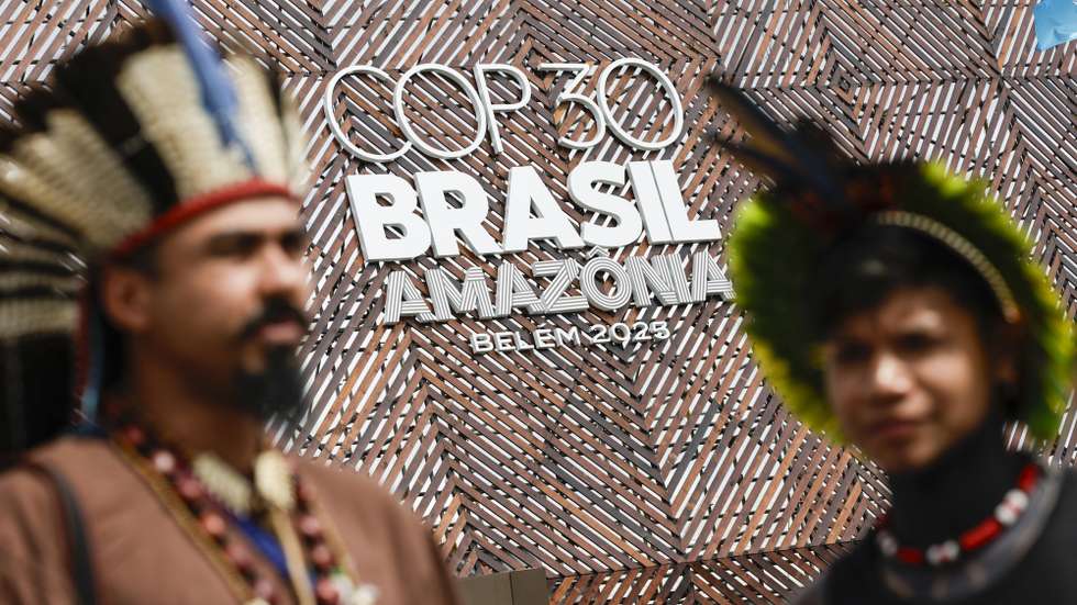 epa12518811 Indigenous people from the Pataxo tribe, from the state of Bahia, attend COP30 in Belem, Brazil, 11 November 2025. Representatives from some 170 countries are participating in the 30th United Nations Climate Change Conference, COP30, which will run until November 21.  EPA/Andre Coelho