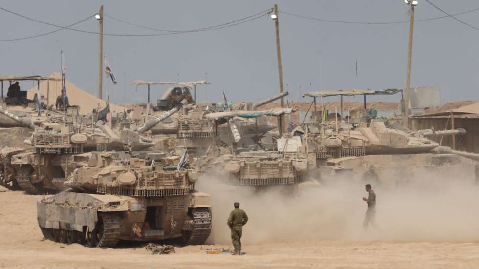 epa12294758 Israeli armored vehicles seen near the Gaza Border, in southern Israel, 12 August 2025. Over 61,400 Palestinians have been killed in the Gaza Strip since October 2023, according to the Palestinian Ministry of Health, and about 1,200 Israelis have been killed since the launch of an Israeli military campaign in response to a cross-border attack by Hamas on 07 October 2023  EPA/ABIR SULTAN