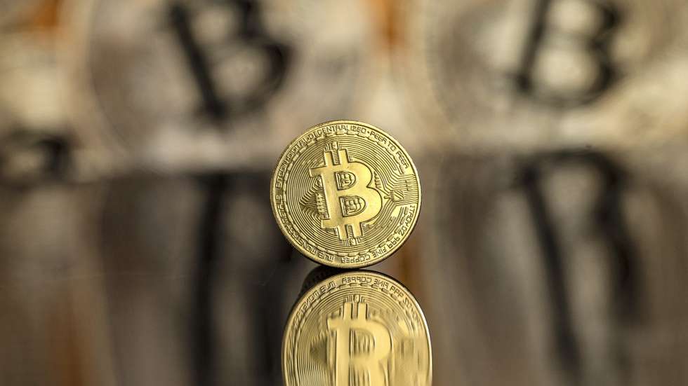 epa11734561 An illustration shows a symbolic Bitcoin, in Lugano, Switzerland, 22 November 2024. The world's most popular cryptocurrency hit a record high on 21 November, approaching the 100,000 US dollar (USD) mark. Bitcoin has been regularly hitting fresh records this month on hopes that US President-elect Donald Trump will usher in a golden age of cryptocurrencies.  EPA/PABLO GIANINAZZI