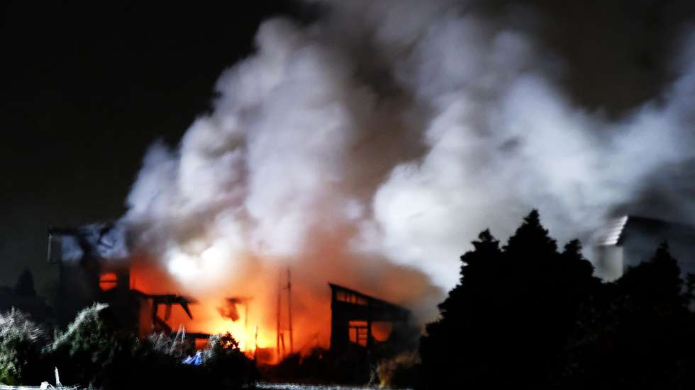 epa12579509 A house burns after a powerful earthquake in Aomori, northeastern Japan, early 09 December 2025. A powerful quake with a magnitude of 7.5 hit northeastern Japan late 08 December 2025 triggering a tsunami warning in coastal areas of northeastern Japan and Hokkaido. All tsunami warnings have been lifted in the morning of 09 December 2025.  EPA/JIJI PRESS JAPAN OUT EDITORIAL USE ONLY/