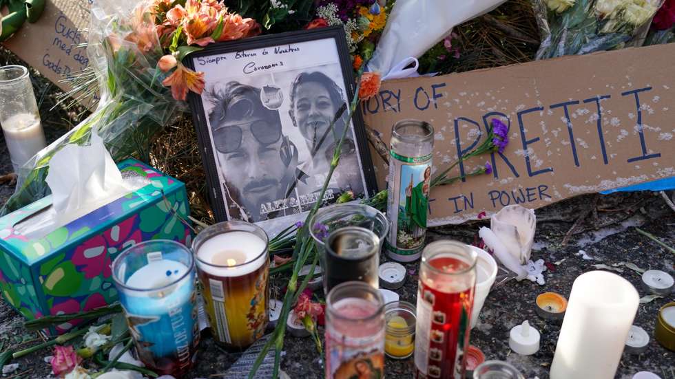 epa12681006 Flowers, candles and photographs are left at a makeshift memorial for Alex Pretti in south Minneapolis, Minnesota, USA, 25 January 2026. Pretti, a 37-year-old intensive care unit (ICU) nurse, was fatally shot by US Border Patrol agents on 24 January. Local leaders have condemned the shooting and called for the withdrawal of federal forces, while the Department of Homeland Security maintained that agents acted in self-defense during a struggle with an armed individual.  EPA/CRAIG LASSIG
